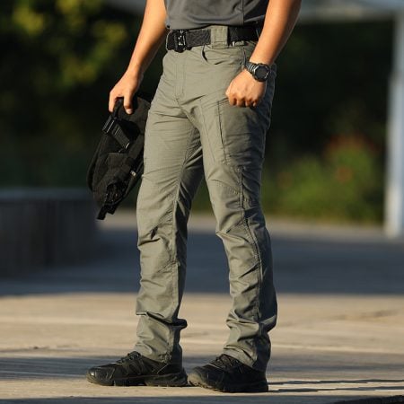 Men's tactical cargo pants in camouflage color for outdoor activities.