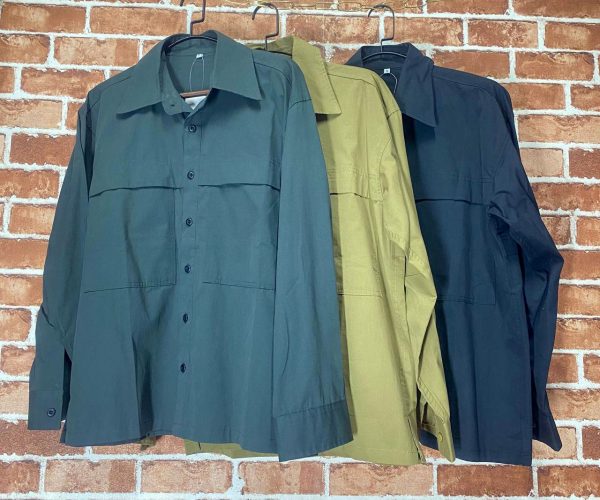 Long-sleeve tactical shirts in green, khaki, and navy blue for outdoor use.