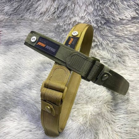 Tactical belt in black and tan colors for outdoor use.