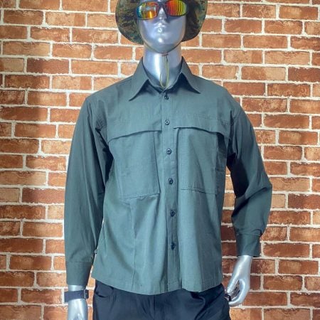 Green tactical shirt with long sleeves and front pockets, outdoor use.